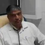 Dr. Dinesh Rustogi